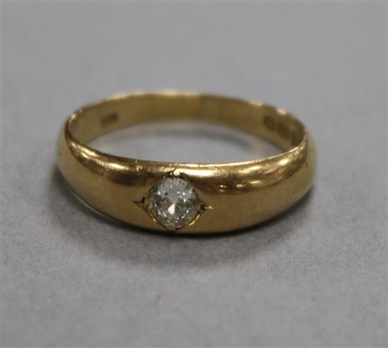 An Edwardian 18ct gold and gypsy set diamond ring, size U.